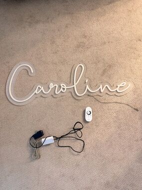LIGHT UP SIGN DC White and Black LED (spells “Caroline”)